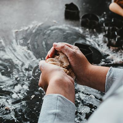 Person making dough with hands